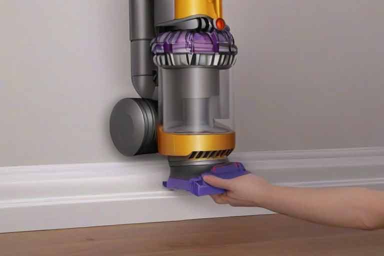 ¿Cómo vaciar el depósito de mi aspiradora Dyson?